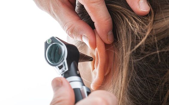 person getting a hearing exam