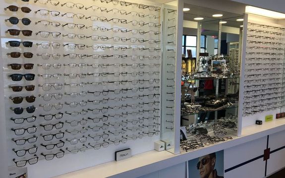 wall of glasses at The Optical & Hearing Center